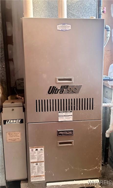 utility room with heating unit