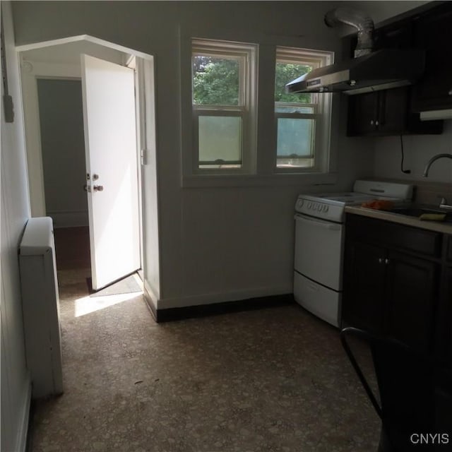 kitchen featuring white range with electric cooktop, range hood, a sink, and light countertops