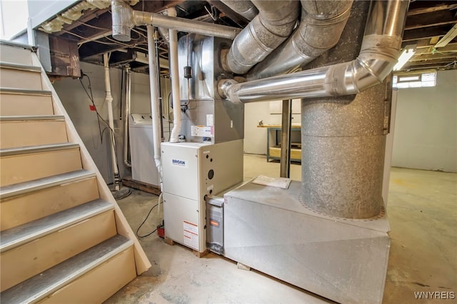 below grade area featuring stairway and independent washer and dryer