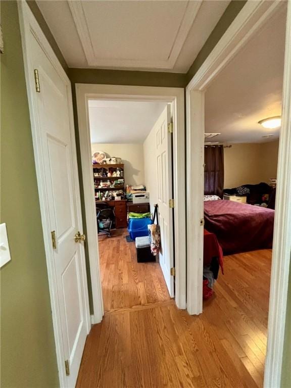 hall featuring wood finished floors