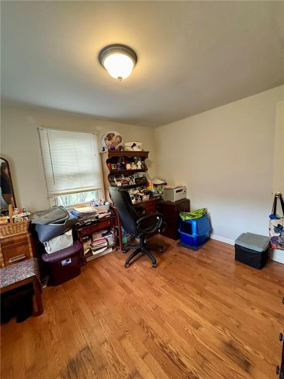 office area with wood finished floors