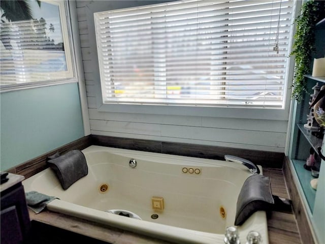 bathroom with a whirlpool tub
