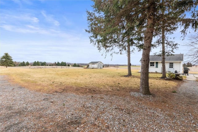 2481 County Road 20, Phelps, NY 14432 - view of green lawn featuring an outbuilding and a rural view