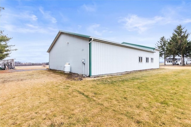 2481 County Road 20, Phelps, NY 14432 - view of home's exterior featuring a lawn
