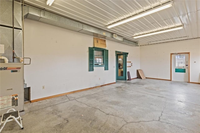 garage with baseboards