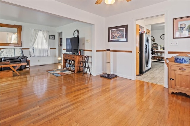 2481 County Road 20, Phelps, NY 14432 - living room featuring light wood-style flooring