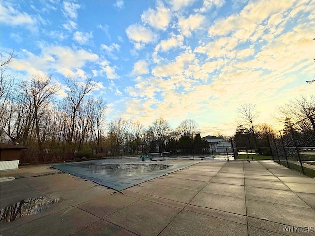 community pool featuring fence