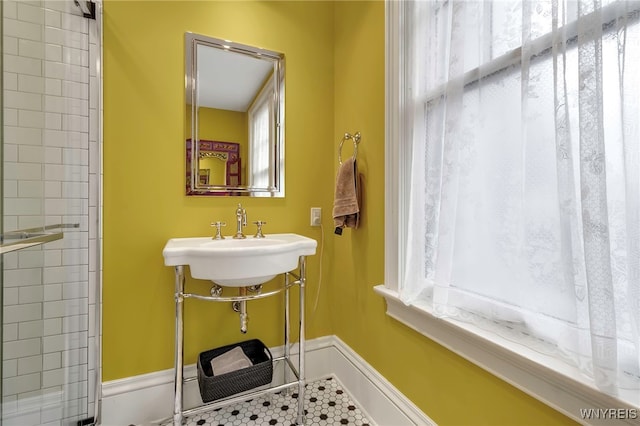 bathroom featuring a healthy amount of sunlight and a sink