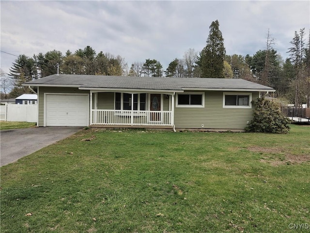 ranch-style house featuring a front lawn, a garage, covered porch, driveway, and fence