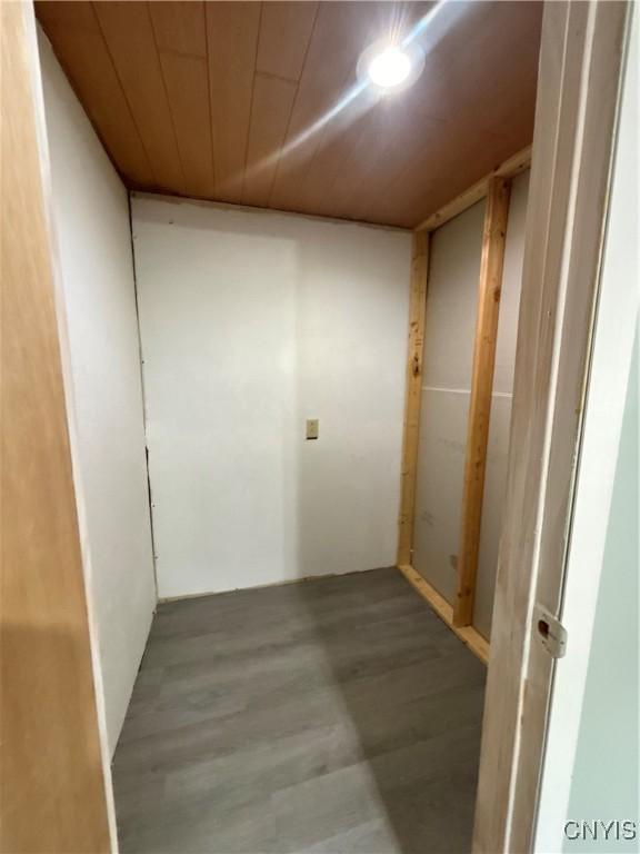 hallway with wood finished floors