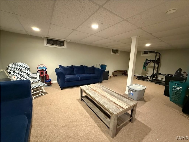 living room featuring recessed lighting, carpet flooring, and a drop ceiling
