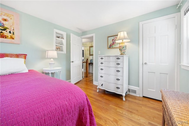 422 Salt Springs Rd, Manlius, NY 13066 - bedroom featuring visible vents, light wood-style flooring, and baseboards