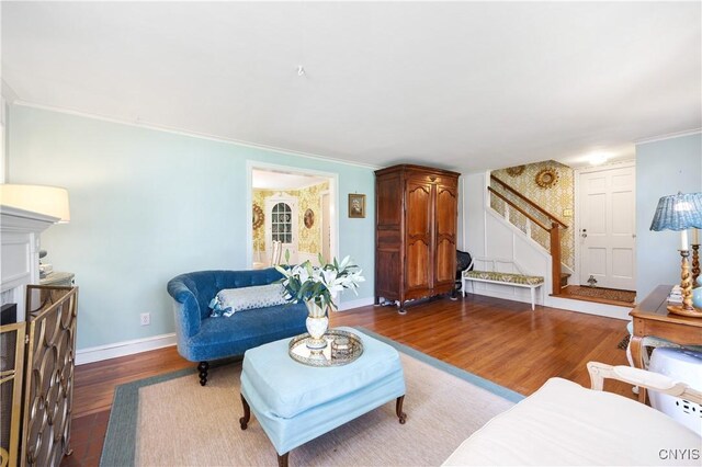 422 Salt Springs Rd, Manlius, NY 13066 - living area featuring stairway, wood finished floors, crown molding, and baseboards