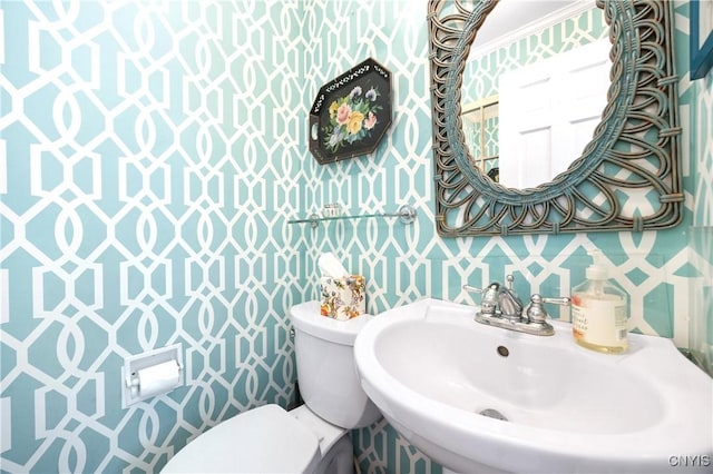 422 Salt Springs Rd, Manlius, NY 13066 - half bath featuring toilet, a sink, and wallpapered walls