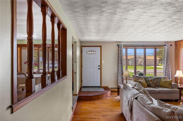 1631 Tuscarora Rd, Niagara, NY 14304 - interior space featuring baseboards, wood finished floors, and a textured ceiling
