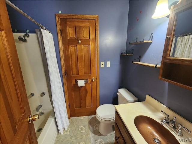 bathroom featuring vanity, toilet, and shower / bath combination with curtain