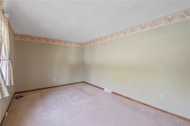 7266 Wakefield Dr, Manlius, NY 13066 - empty room featuring visible vents, baseboards, and carpet floors