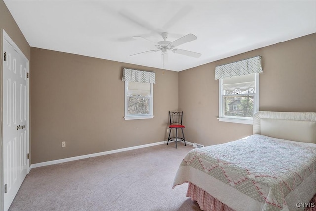 7266 Wakefield Dr, Manlius, NY 13066 - carpeted bedroom with baseboards and a ceiling fan
