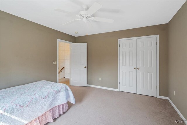 7266 Wakefield Dr, Manlius, NY 13066 - carpeted bedroom with baseboards, ceiling fan, and a closet
