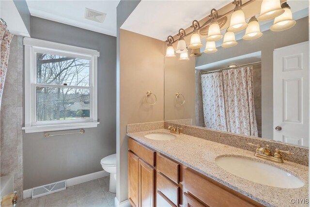 7266 Wakefield Dr, Manlius, NY 13066 - full bathroom featuring baseboards, visible vents, toilet, and a sink