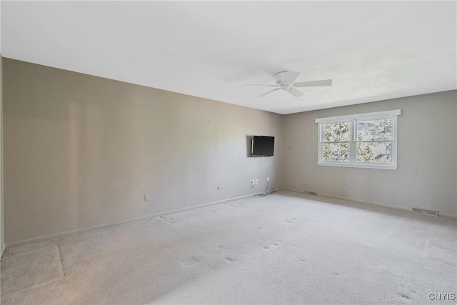 7266 Wakefield Dr, Manlius, NY 13066 - spare room with visible vents, ceiling fan, baseboards, and carpet floors