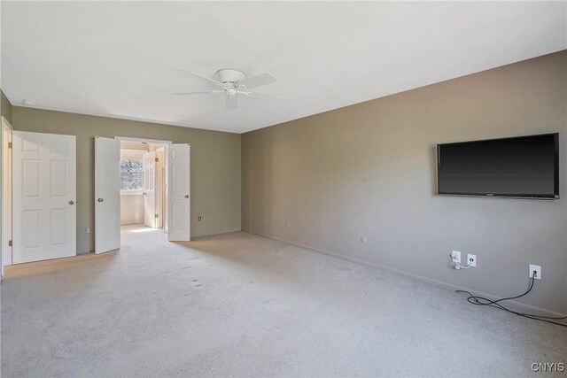 7266 Wakefield Dr, Manlius, NY 13066 - interior space featuring baseboards, ceiling fan, and light colored carpet