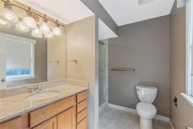 7266 Wakefield Dr, Manlius, NY 13066 - full bathroom with baseboards, tile patterned floors, a shower stall, and toilet