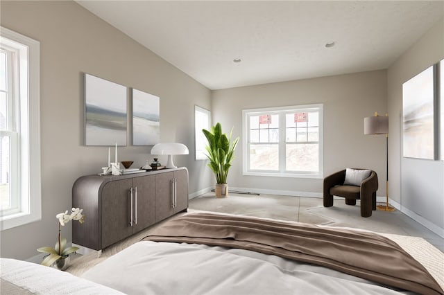 bedroom featuring baseboards