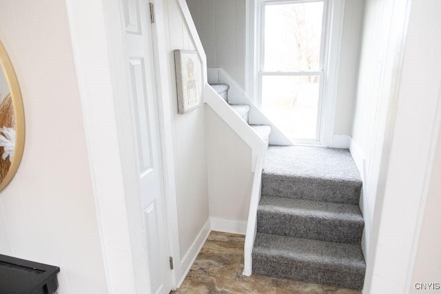 stairs featuring baseboards