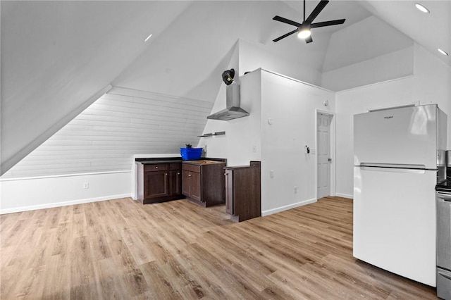 interior space featuring light wood finished floors, recessed lighting, high vaulted ceiling, a ceiling fan, and baseboards