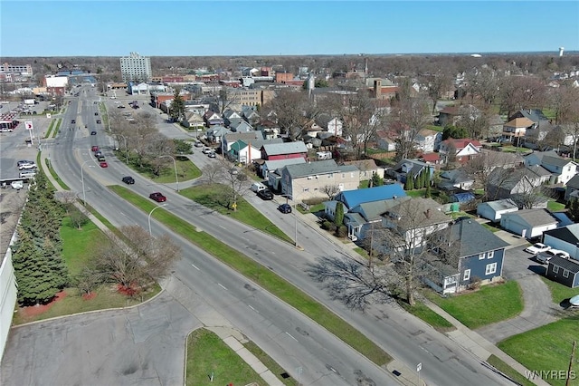 birds eye view of property with a residential view