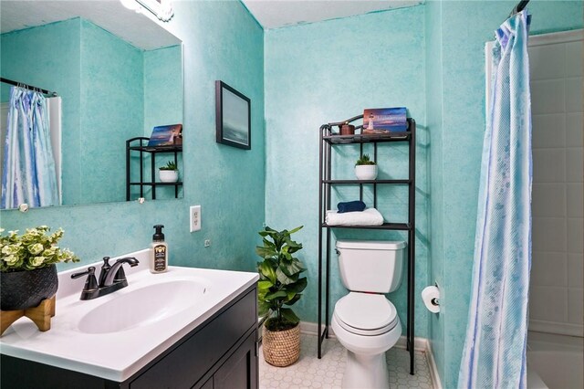 full bath featuring shower / tub combo, toilet, tile patterned flooring, and vanity