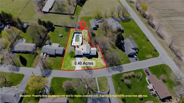 birds eye view of property featuring a rural view