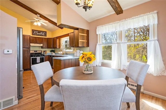 dining room with beam ceiling, light wood-style floors, visible vents, baseboards, and ceiling fan with notable chandelier