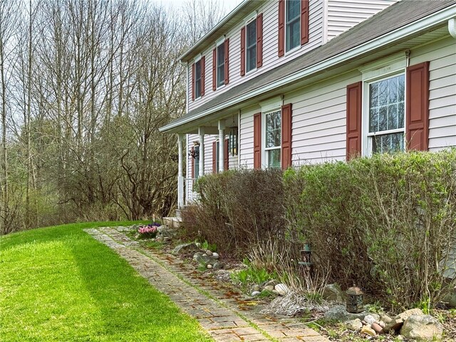 5876 Clearview Ln, Alfred, NY 14803 - view of home's exterior featuring a lawn