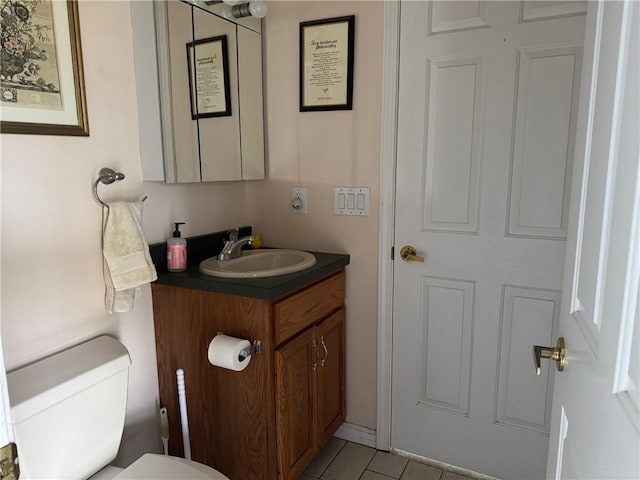 5876 Clearview Ln, Alfred, NY 14803 - half bath with tile patterned floors, toilet, and vanity