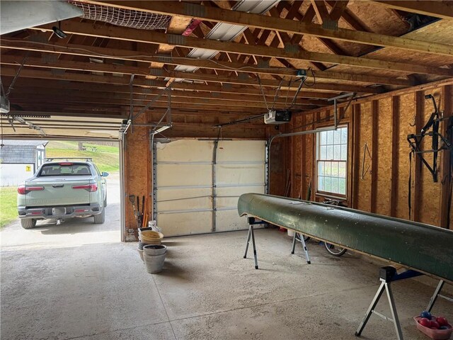 5876 Clearview Ln, Alfred, NY 14803 - garage featuring a garage door opener