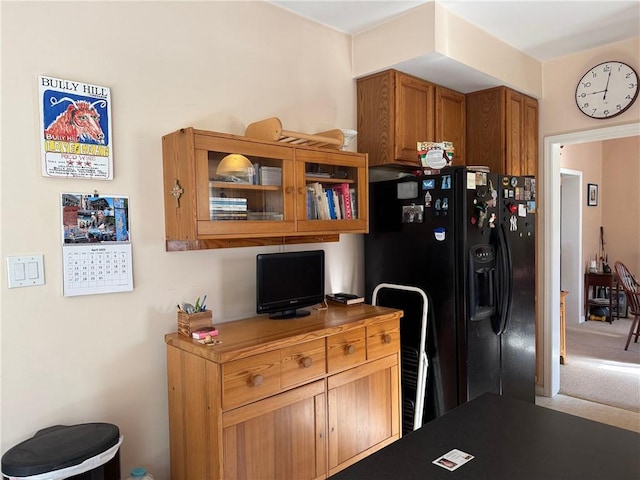 5876 Clearview Ln, Alfred, NY 14803 - kitchen with black fridge and brown cabinets