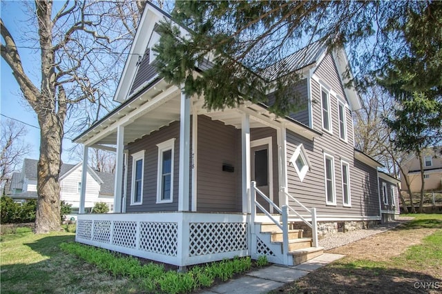 view of front facade featuring a porch and entry steps