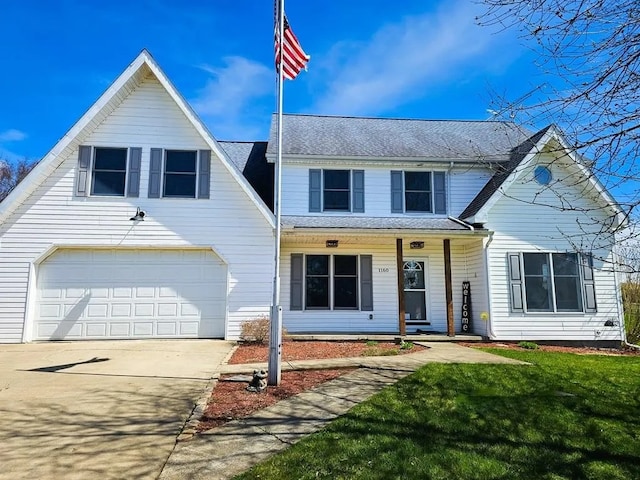 traditional home featuring covered porch, a shingled roof, a garage, a front lawn, and concrete driveway