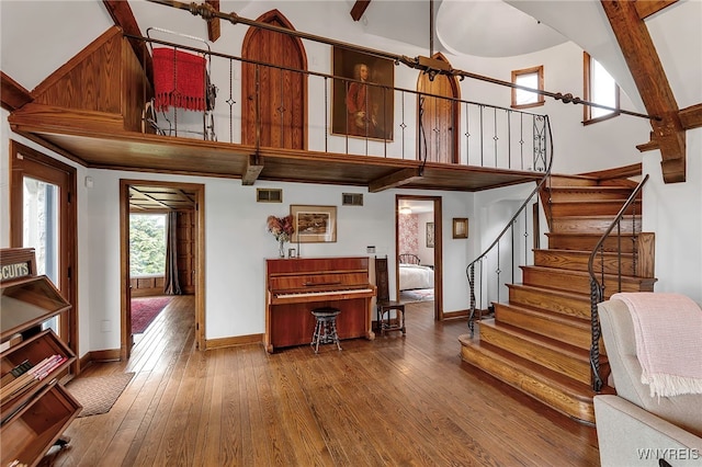 4482 Lower River Rd, Lewiston, NY 14092 - entryway featuring baseboards, stairs, visible vents, and hardwood / wood-style floors