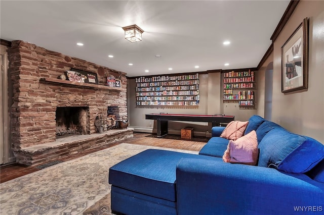 4482 Lower River Rd, Lewiston, NY 14092 - living area featuring crown molding, baseboard heating, recessed lighting, and wood finished floors