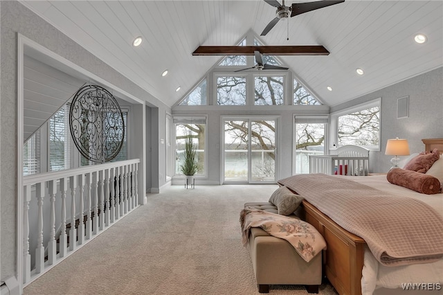 carpeted bedroom with recessed lighting, beamed ceiling, a water view, and multiple windows
