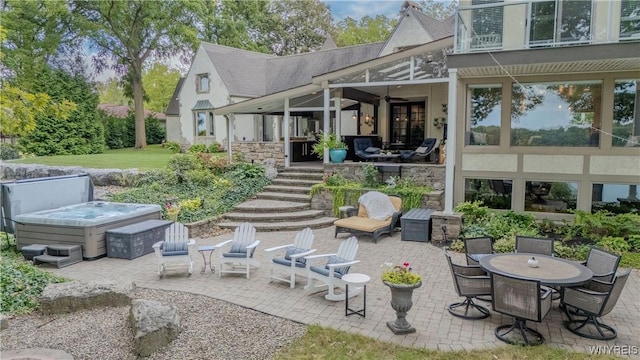 4482 Lower River Rd, Lewiston, NY 14092 - view of patio / terrace featuring a hot tub, stairs, and outdoor dining area