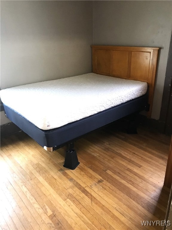 bedroom featuring hardwood / wood-style flooring