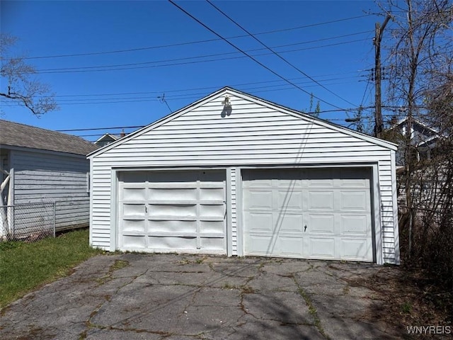 detached garage with fence