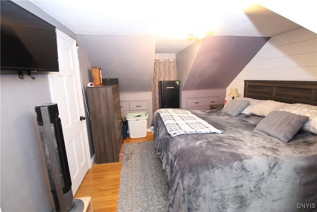 bedroom featuring light wood finished floors
