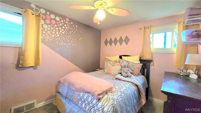 bedroom featuring visible vents, ceiling fan, and baseboards