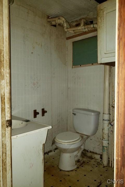 24 Railroad St, Elbridge, NY 13080 - bathroom with vanity and toilet