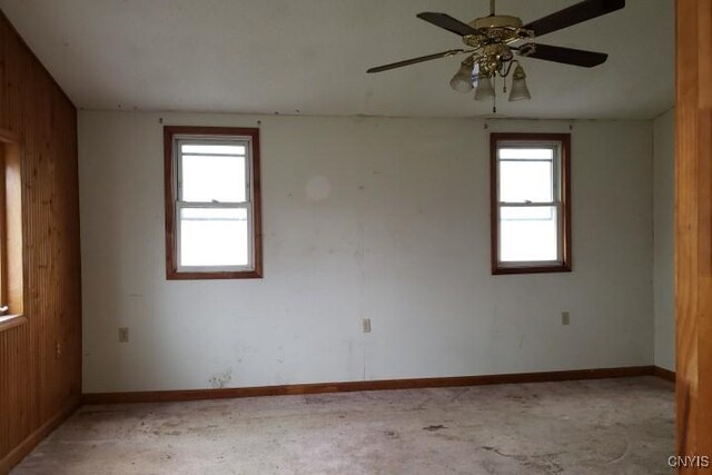 24 Railroad St, Elbridge, NY 13080 - spare room with ceiling fan, baseboards, and a healthy amount of sunlight